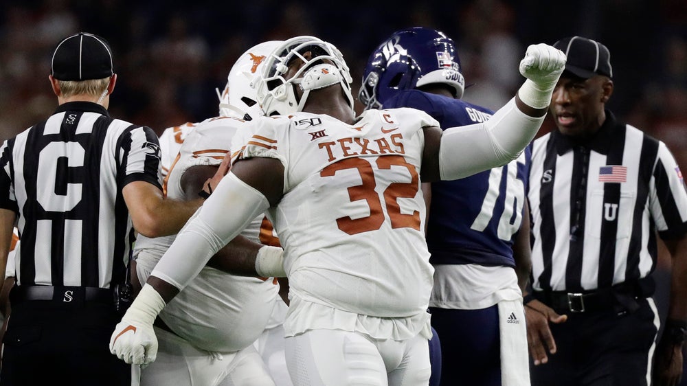 Ehlinger throws 3 TD passes, No. 12 Texas beats Rice 48-13