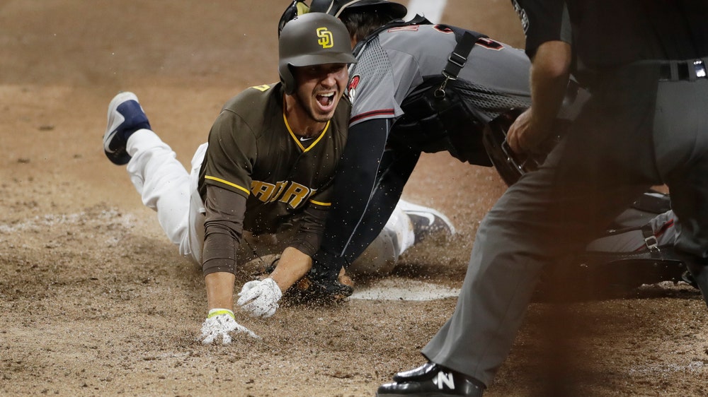 Galvis’ double lifts Padres over Diamondbacks 3-2 in 14