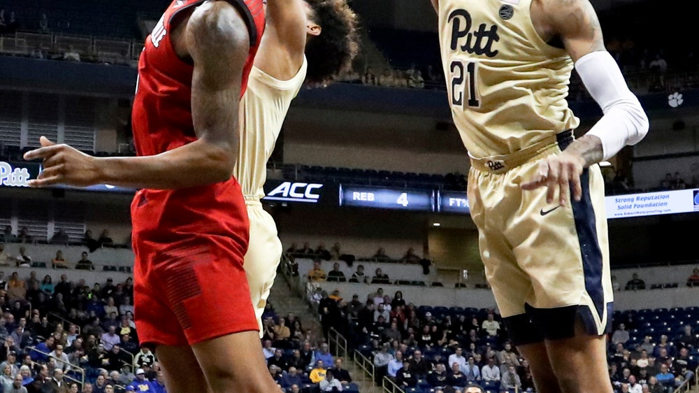 Pitt snaps long ACC losing skid, tops Louisville 89-86 in OT