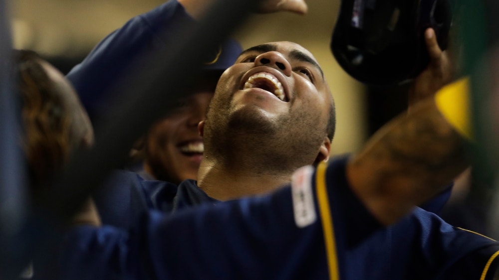 Aguilar busts out with 2 HR, Brewers beat Rox without Yelich