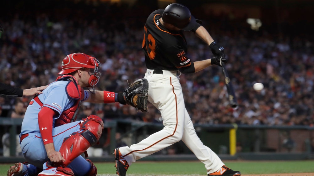 Giants overcome injury to Bumgarner, beat Cardinals 8-4