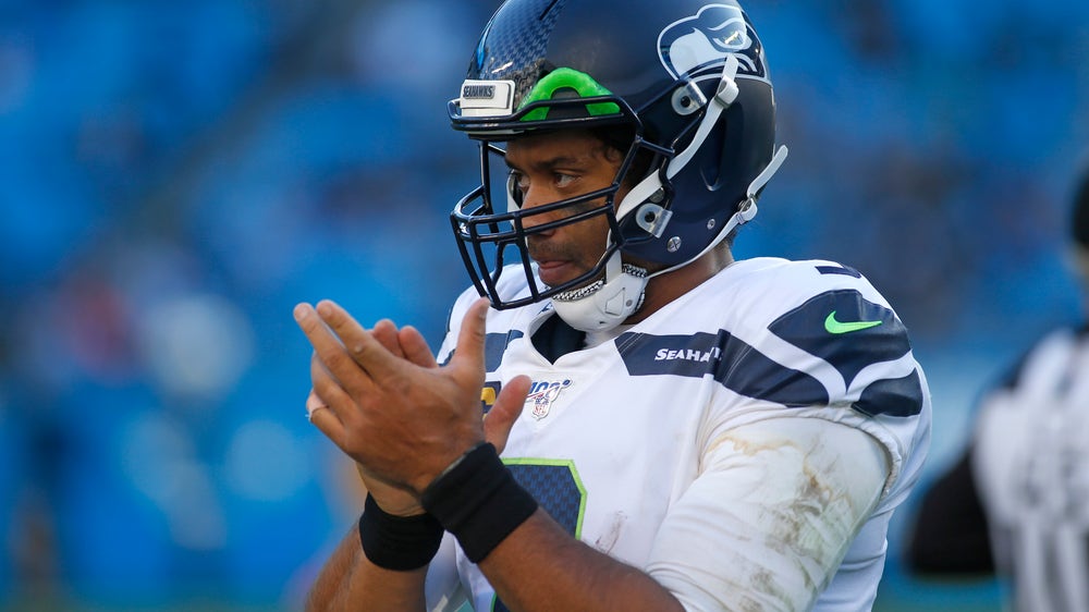 Wilson, Carson help Seahawks clinch NFC playoff spot