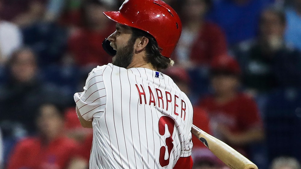 Phillies star Harper leaves game after foul ball off foot