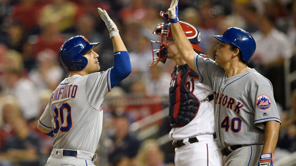 Lobaton’s sacrifice fly lifts Mets past Nationals in 12