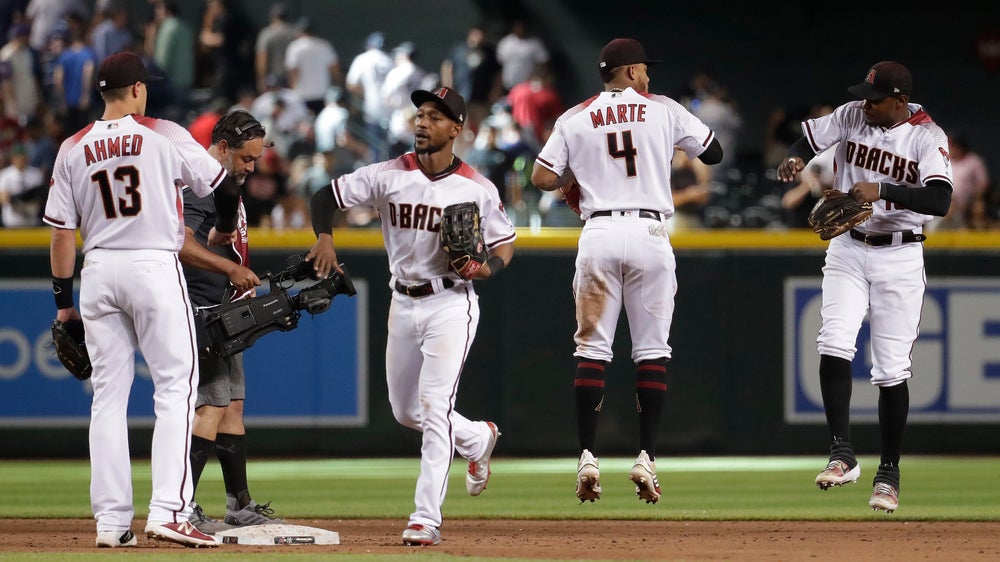 Marte, Kelly lead D-backs over Yankees 3-2 for 2-game sweep