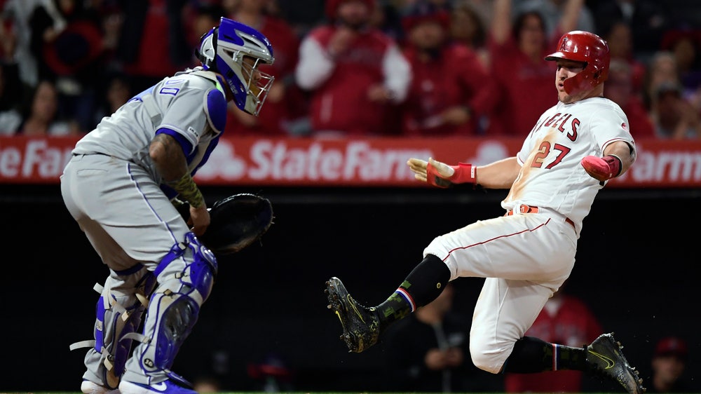 Trout, Pujols back Harvey and lift Angels over Royals 5-2