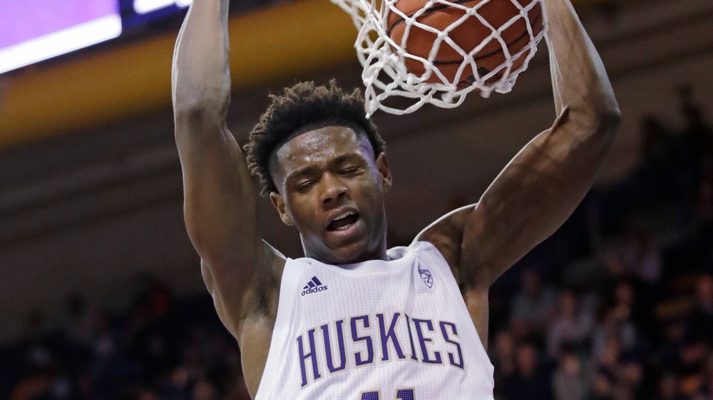 No. 25 Washington rebounds from 1st loss, tops Maine 72-53
