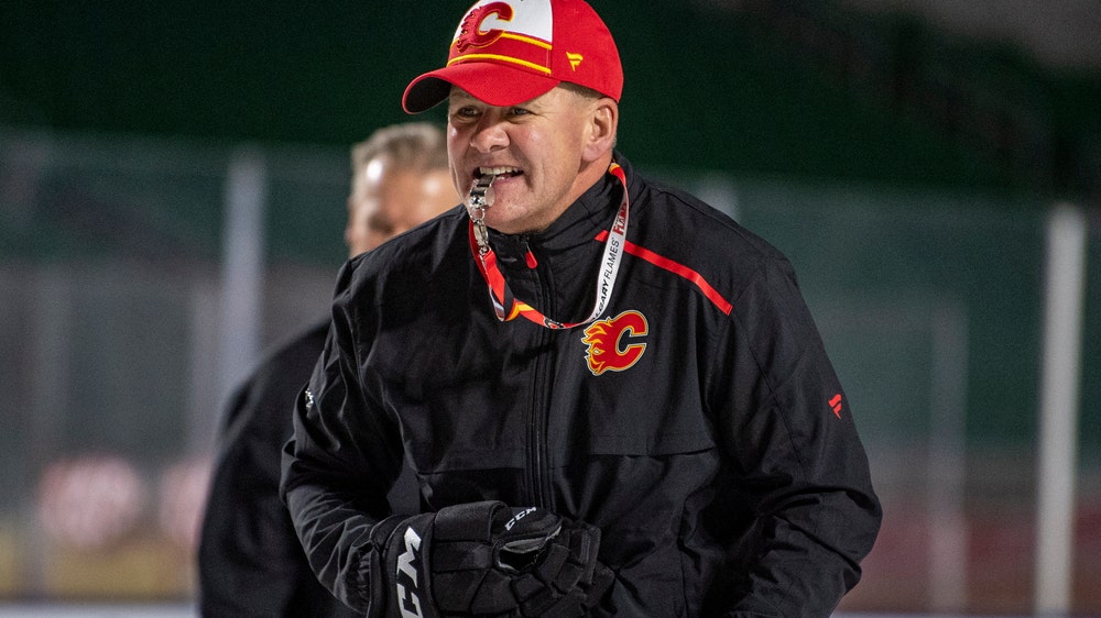 The Latest: Peters will not coach Flames against Sabres