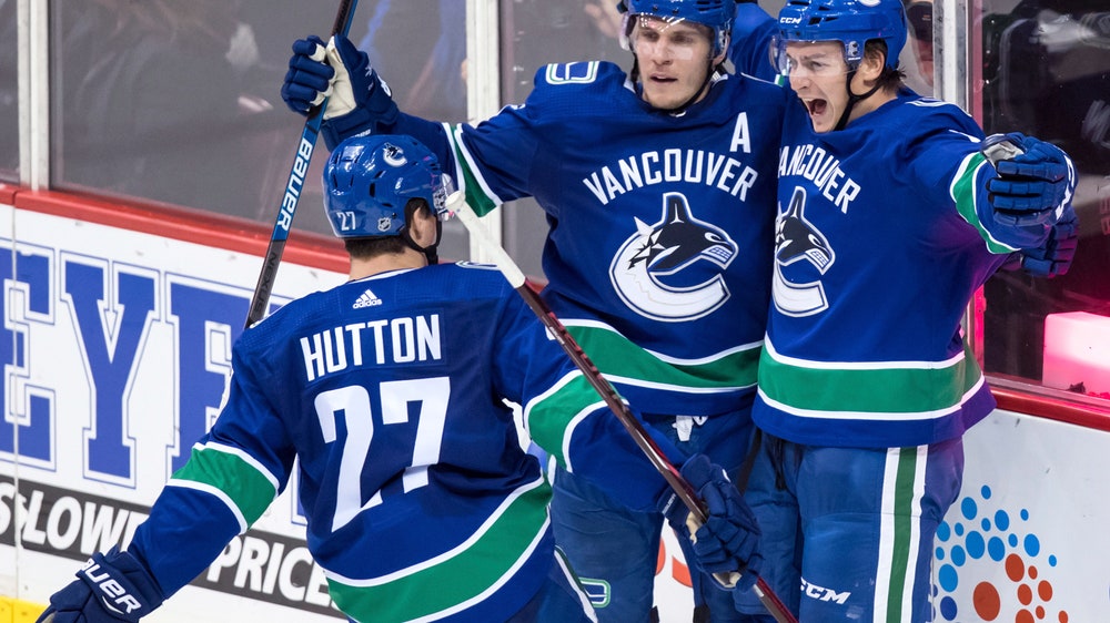 Virtanen scores twice as Canucks beat Blackhawks 4-2