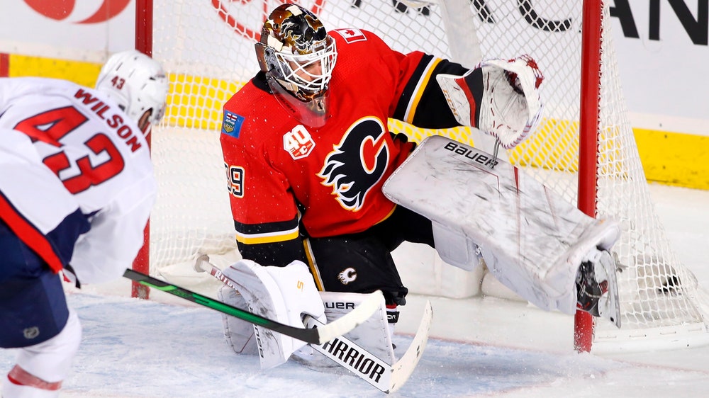 Carlson scores 2 to help Capitals beat Flames 5-3