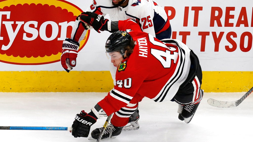 Smith-Pelly starts in return to Chicago after racist taunts