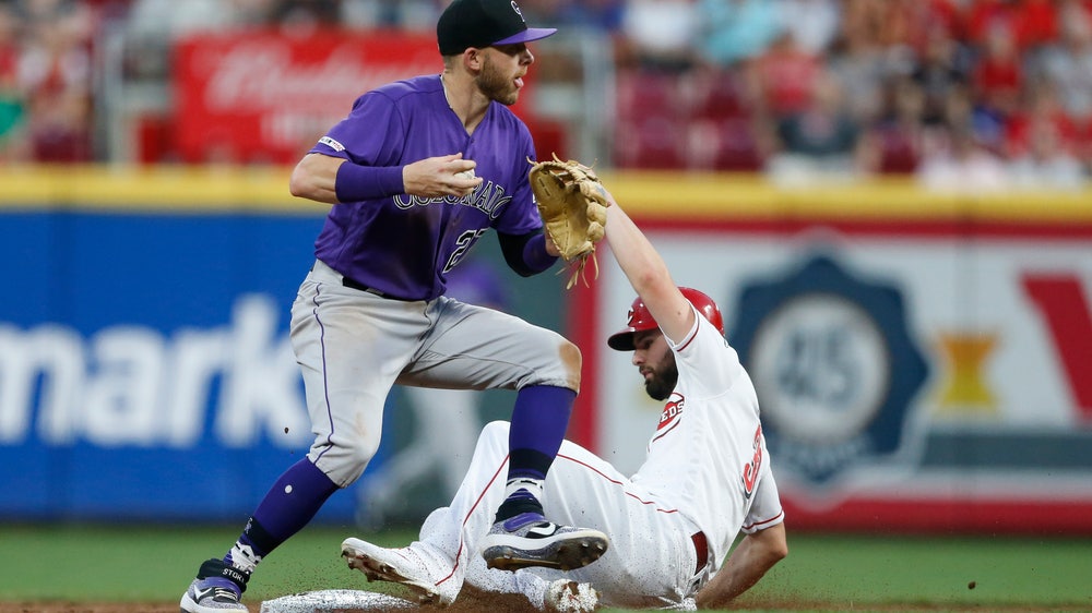 Suárez, VanMeter hit homers, Reds beat Rockies 3-1