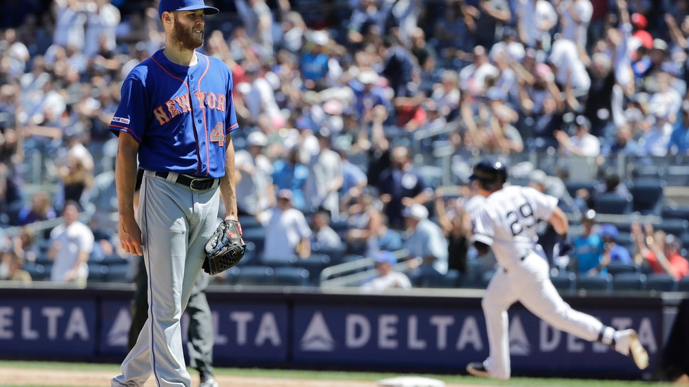Alonso helps Mets gain split; Voit lifts Yanks in opener