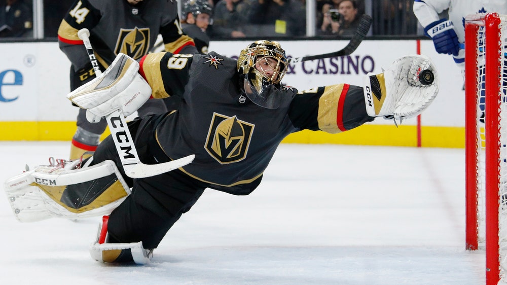 Fleury makes amazing save to hold off Leafs for 450th win