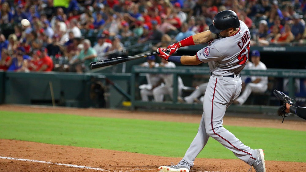 Cave caps 8-run inning with homer; Twins beat Rangers 10-7