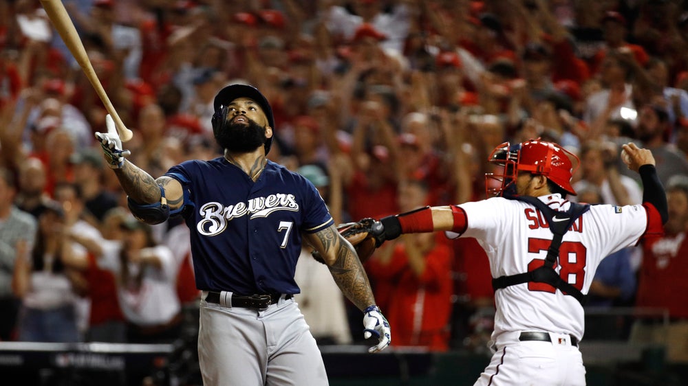 Hader, Grisham combine to give away NL wild-card game