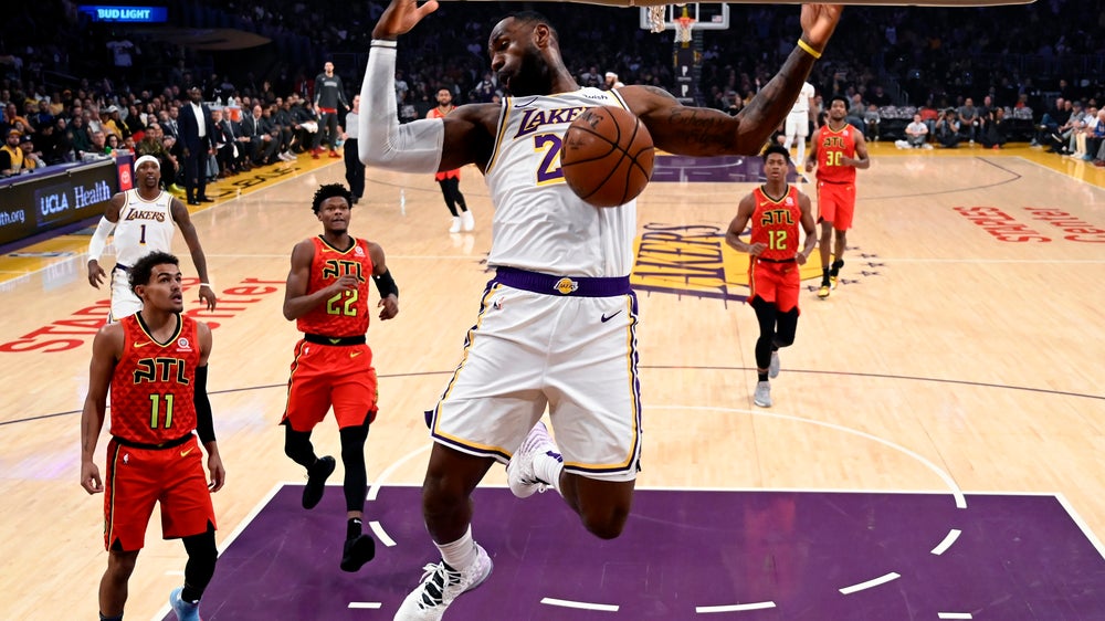 James, Lakers start fast in racing past Hawks 122-101