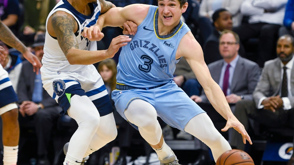 Brooks scores 26; short-handed Grizzlies beat Wolves 115-107