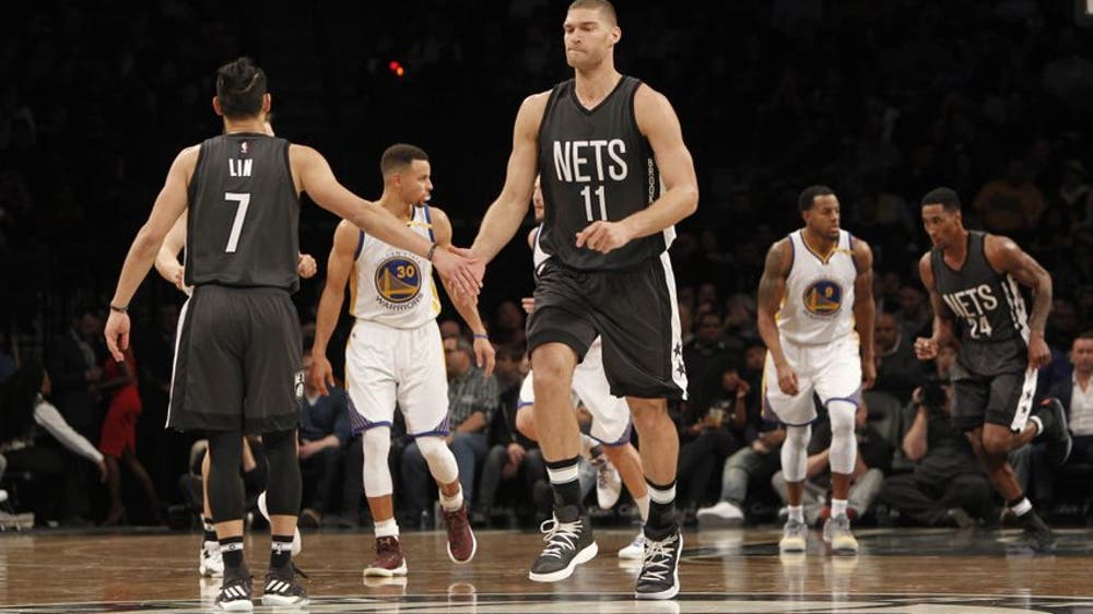 Nets Spread Holiday Cheer in Brooklyn By Giving Back