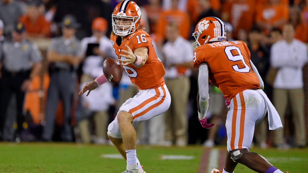 Etienne's 3 TDs lead No. 4 Clemson past Boston College 59-7