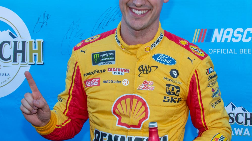 Logano leads pack of Fords to front at Martinsville Speedway