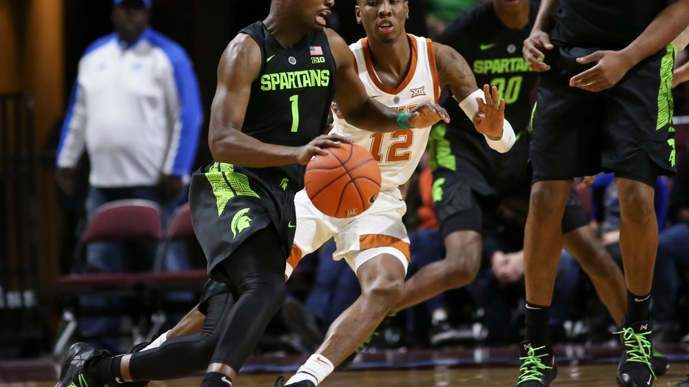 The Latest: No. 11 Michigan State tops Texas for Vegas title