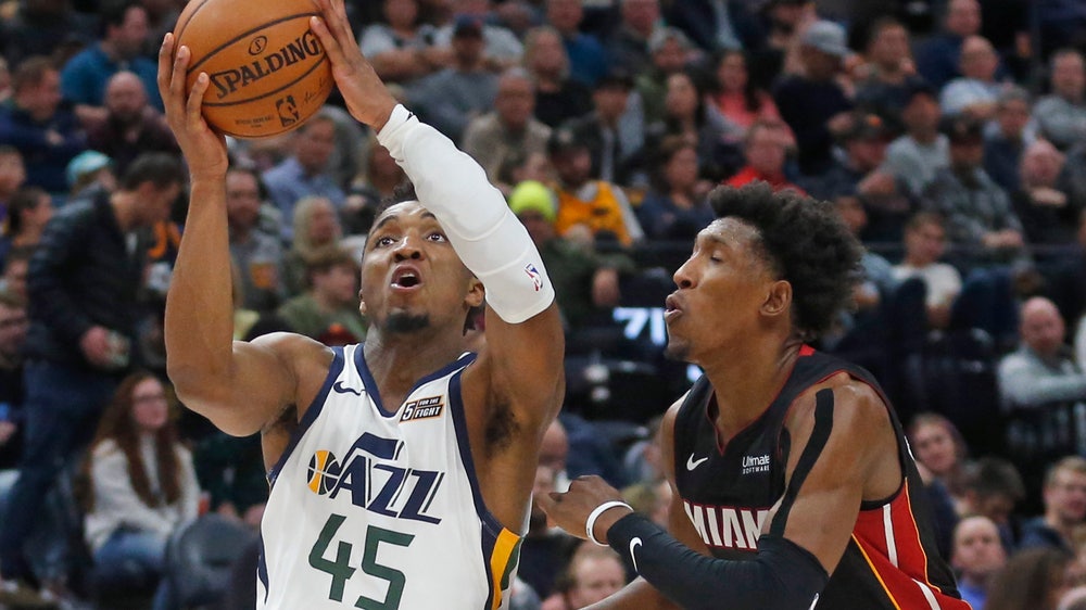 Mitchell, Jazz roll over short-handed Heat 111-84