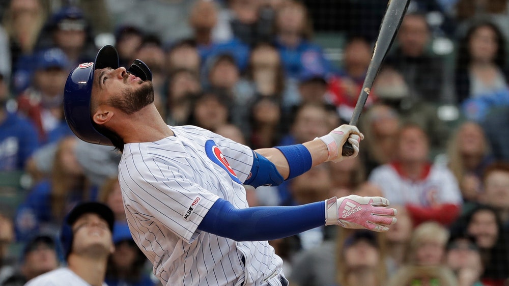 Cubs slugger Kris Bryant exits game after outfield collision