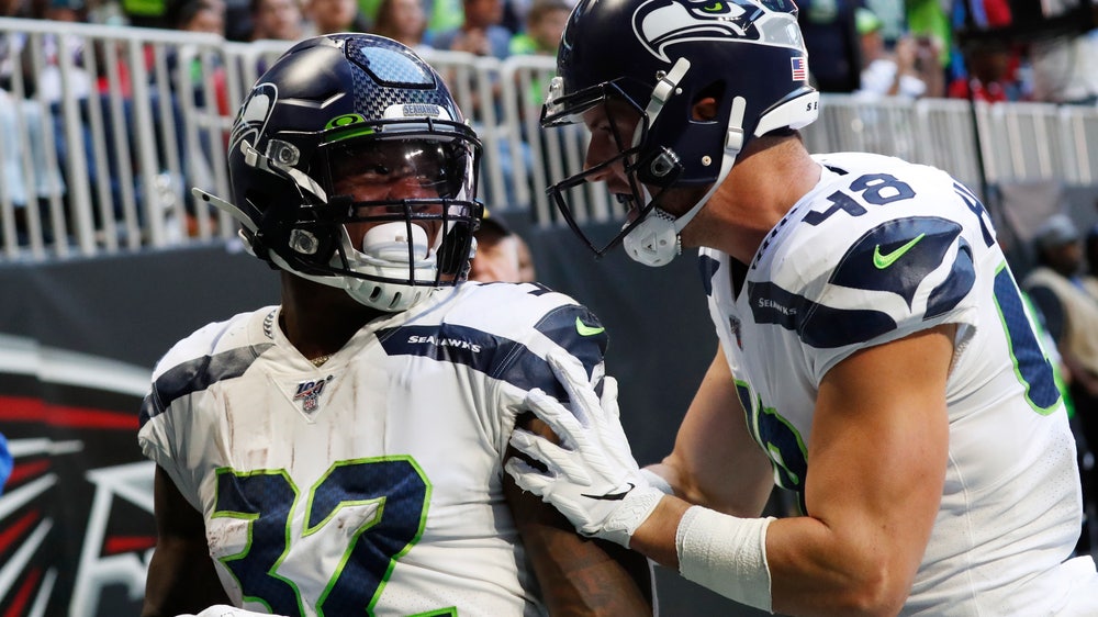 Wilson throws 2 TD passes as Seattle stops Atlanta 27-20