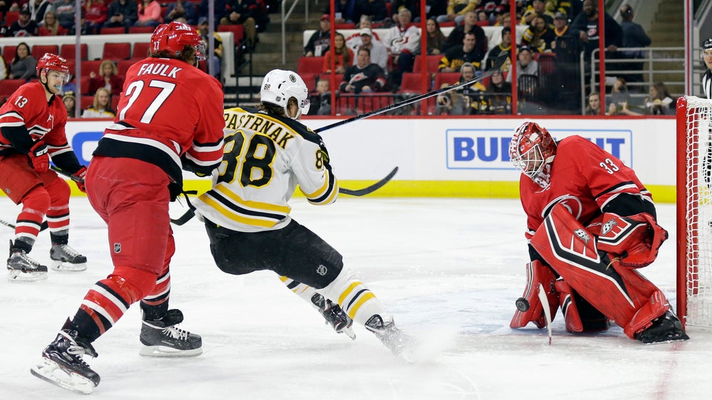 Marchand, Bruins stop Hurricanes 3-2