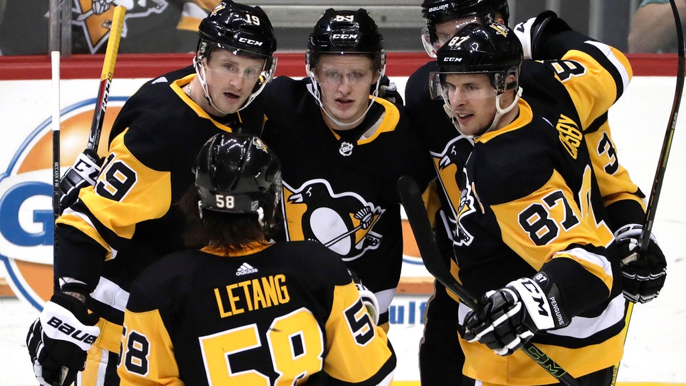 Penguins lock up playoff berth with 4-1 win over Red Wings