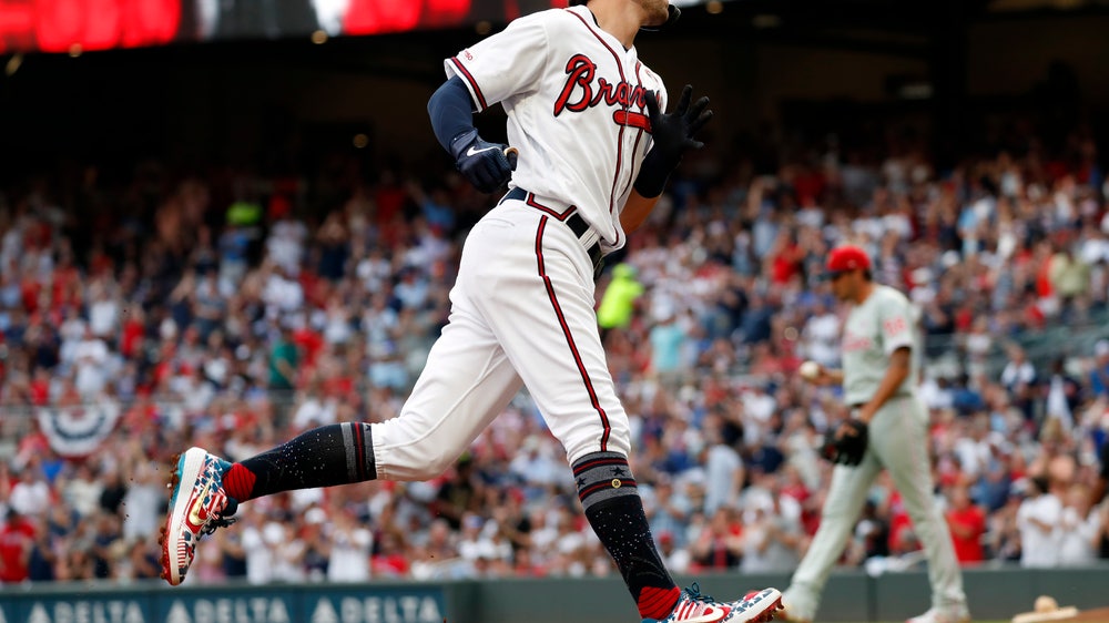 Swanson, Albies helps Braves rally to beat Phillies 12-6
