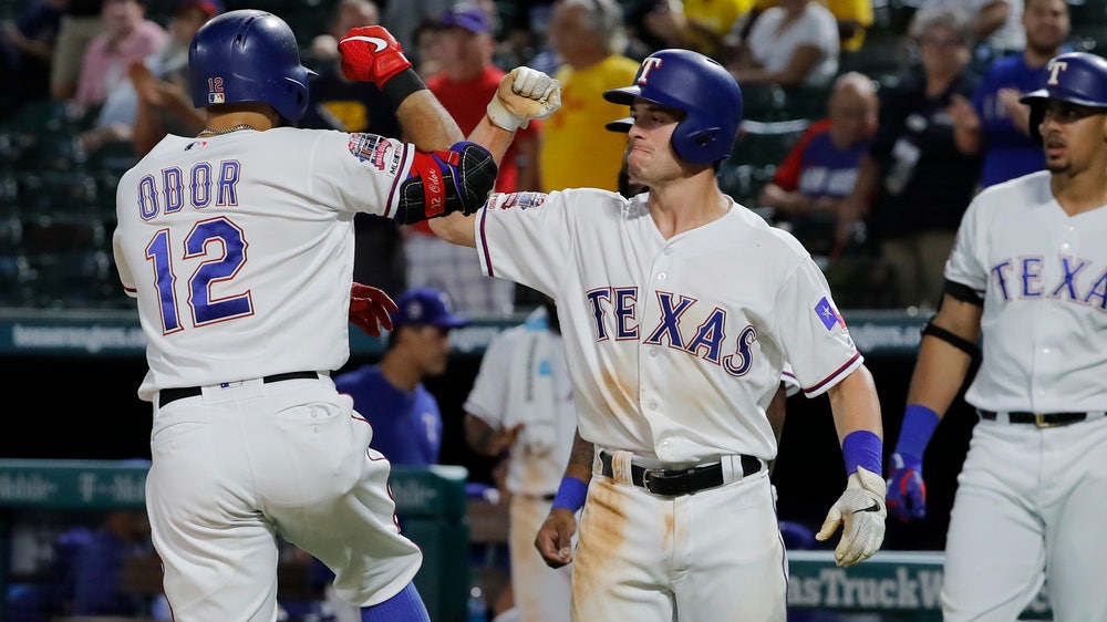 Odor HR pushes Texas past AL wild card-leading Rays 10-9
