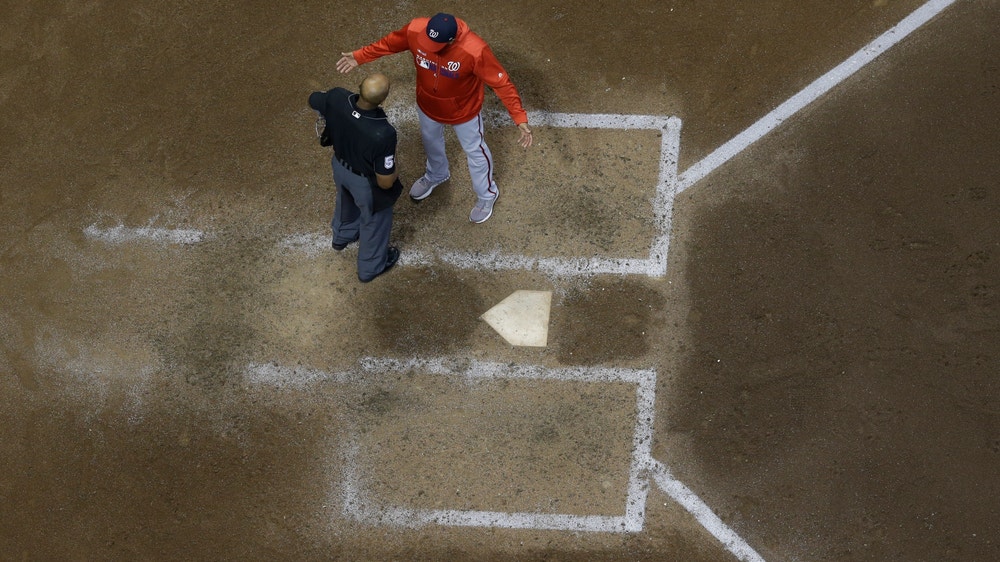 LEADING OFF: Reds deal with odd delays, Rendon miffed