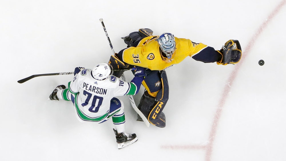 Predators rally with 2 late goals, beat Canucks 3-2