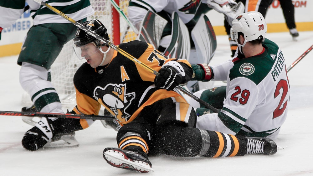 Rust helps Penguins top Wild 2-1