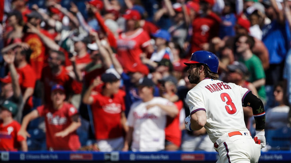 Harper, Realmuto power Phillies past Rockies 7-5 for sweep