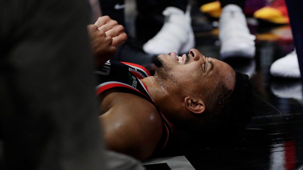 Spurs' win streak at 8; Blazers lose McCollum to leg injury