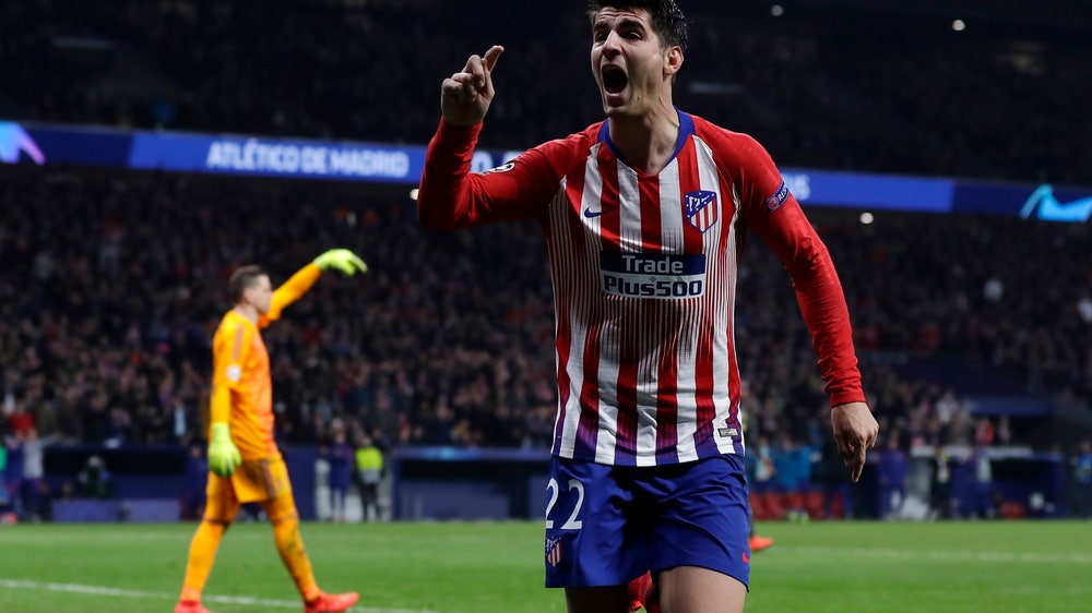 Morata scores 2 to keep Atletico in touch with Barcelona