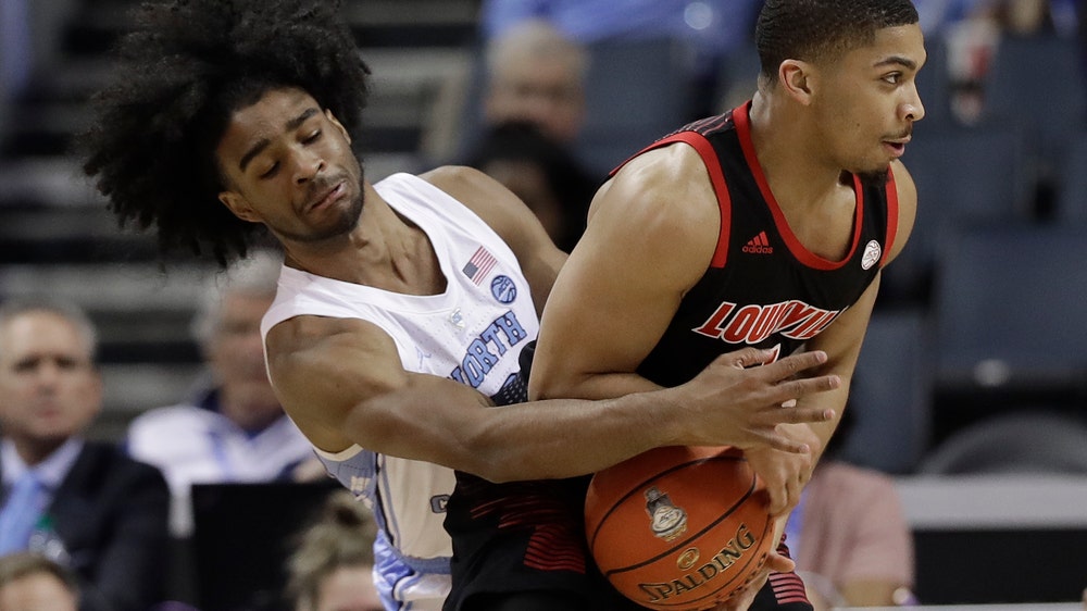 No. 3 North Carolina beats Louisville 83-70 in ACC quarters