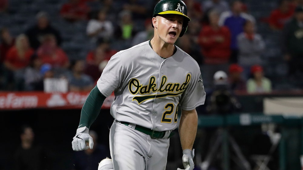 Chapman HR in 9th, A's help wild-card hopes, top Angels 3-2