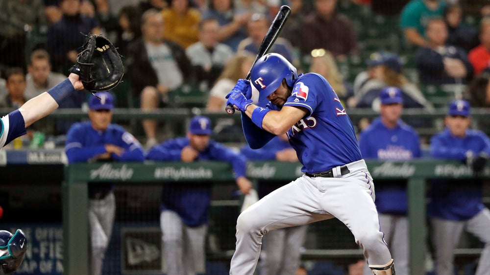Rangers break through in seventh, beat Mariners 2-0