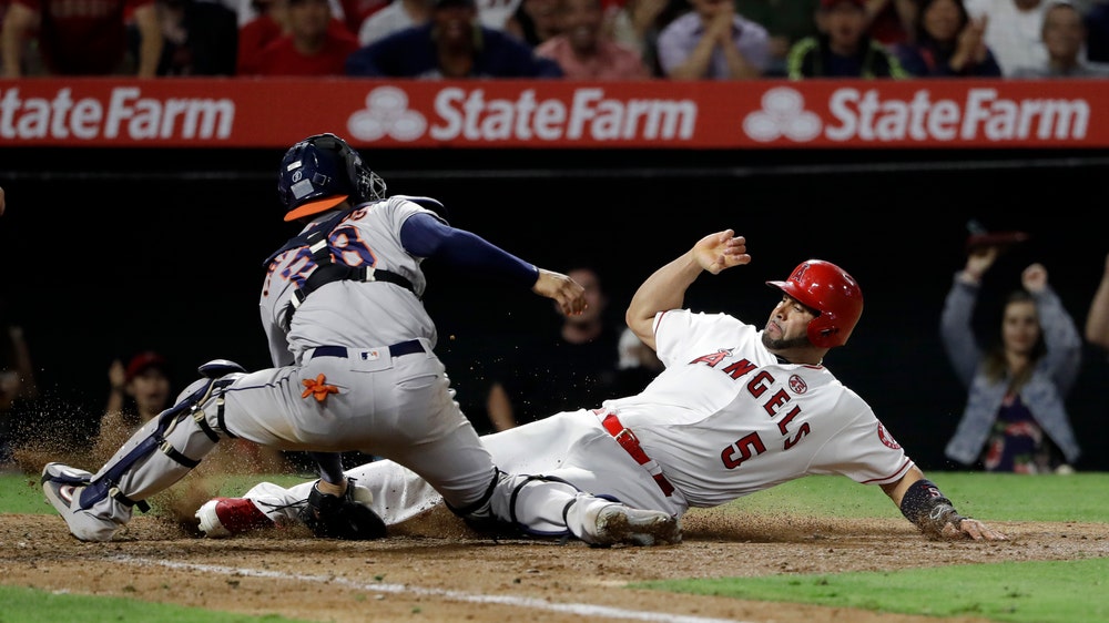 Pujols' 3 hits, 3 RBIs power streaking Halos past Astros 9-6