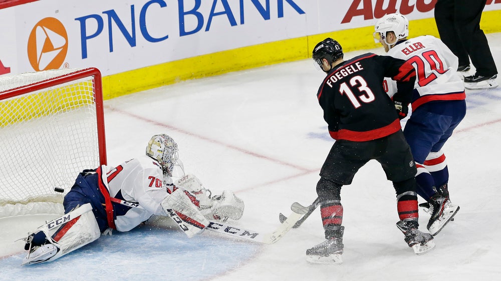 Hurricanes blank Caps 5-0 in 1st home playoff game since ’09