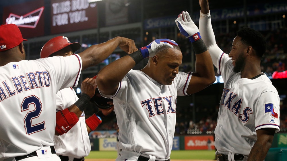 Beltre shines as Rangers top M’s 8-3 in rain-shortened game