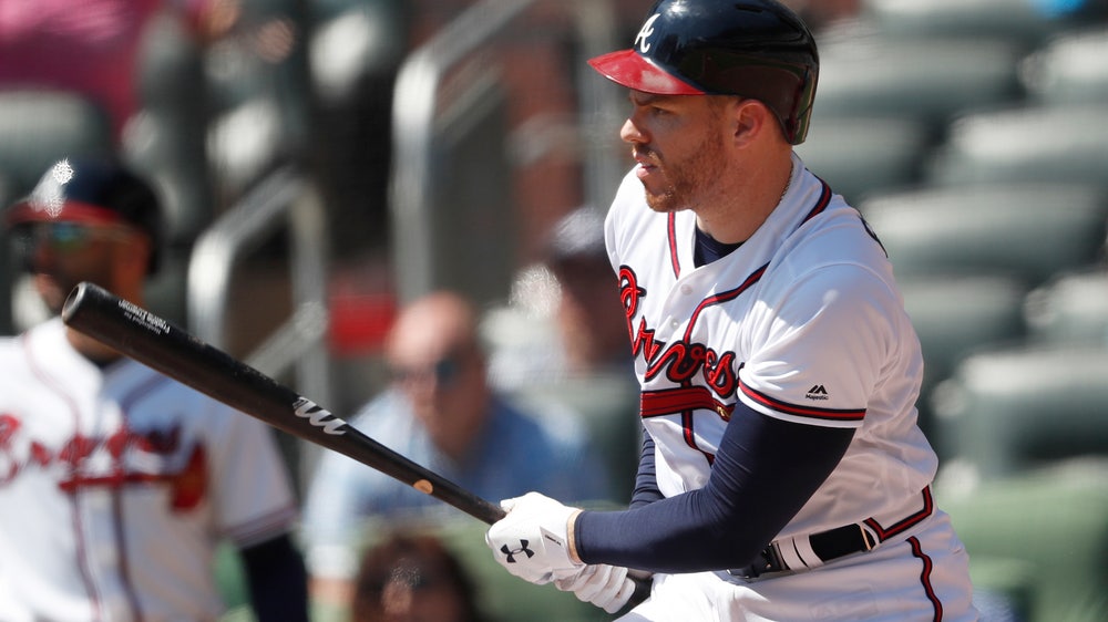 Freeman, Toussaint help Braves beat Cardinals 7-3