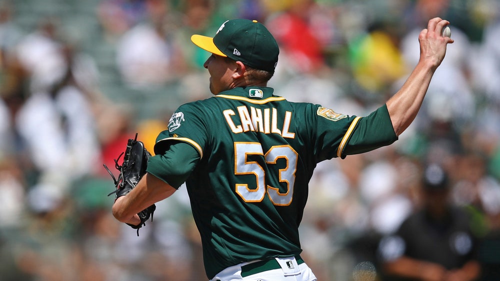 Cahill sharp, A’s beat Astros 7-1 to tie for AL West lead