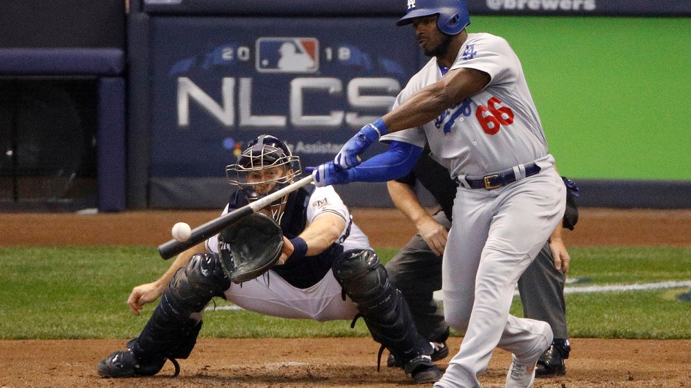 Dodgers send Puig, Wood to Reds for Homer Bailey