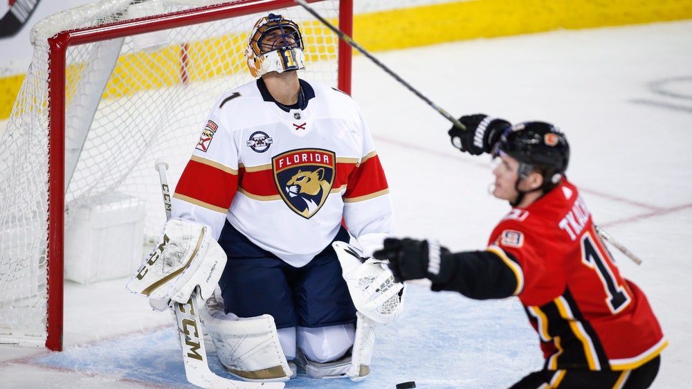 Frolik rallies streaking Flames to 4-3 win over Panthers