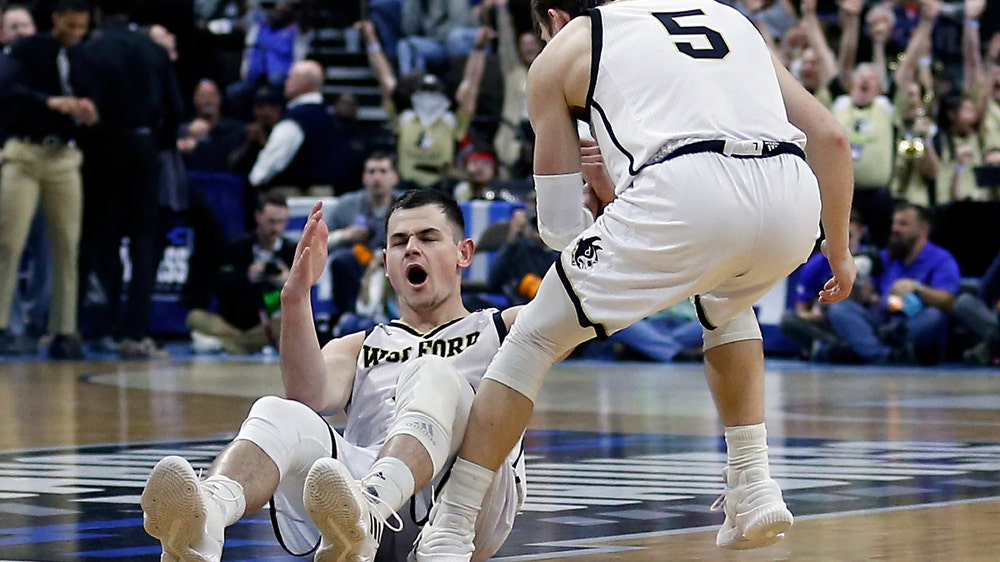 Magee sets record, Wofford tops Seton Hall for 1st NCAA win